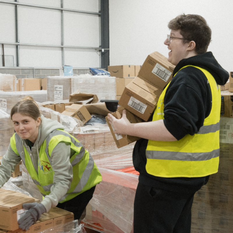 The team at Cwtch Mawr Multibank, Swansea pack boxes